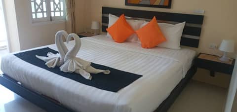 Island Patong Beachfront Apartments — bedroom