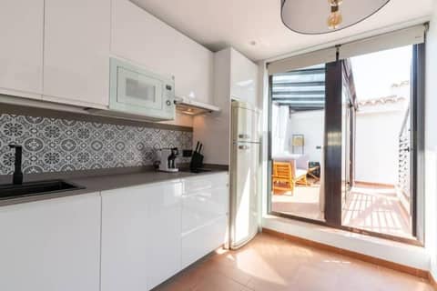 Suites San Pablo — kitchen