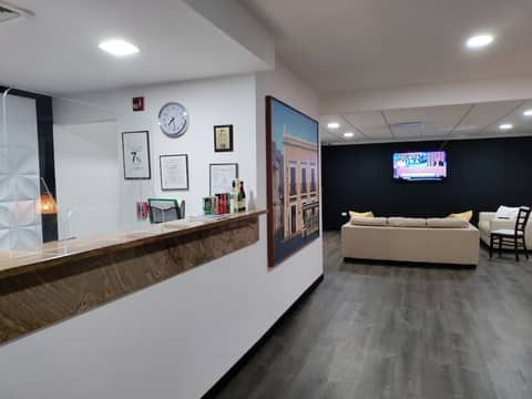 S.J. Suites Hotel — recepcion & lobby
