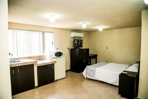Suites DIOH — hotel room