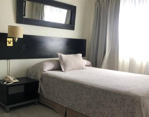 Hotel La Perla — hotel room