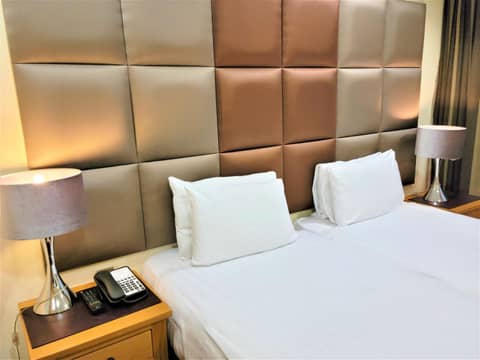 Grand Plaza Serviced Apartments — hotel room
