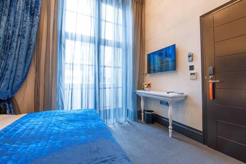 The Exhibitionist Hotel — hotel room