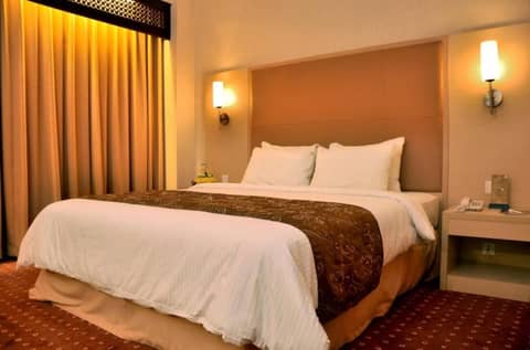 Kartika Chandra — hotel room