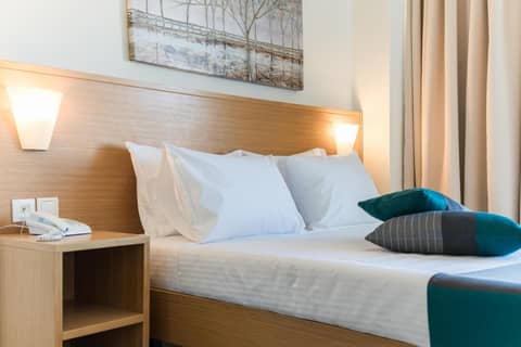 City Center Hotel — bedroom