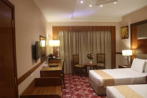 Delmon Hotel — hotel room