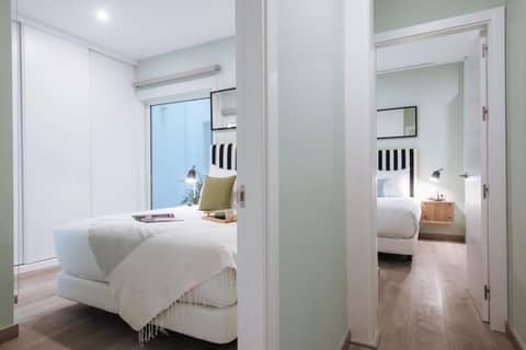 Sercotel Sevilla Guadalquivir Suites — bedroom