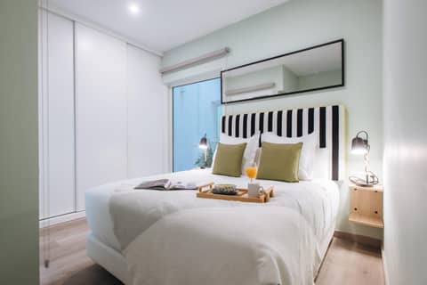 Sercotel Sevilla Guadalquivir Suites — bedroom