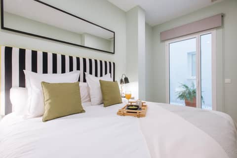 Sercotel Sevilla Guadalquivir Suites — bedroom