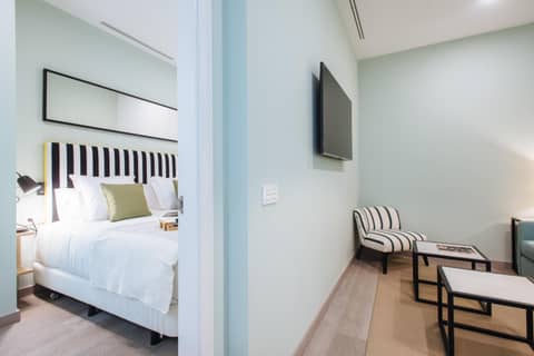 Sercotel Sevilla Guadalquivir Suites — bedroom