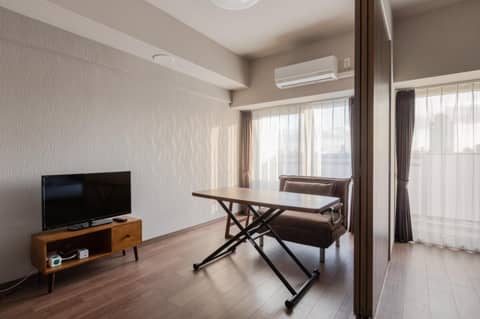 Ostay Shin-Osaka Hotel Apartment — hotel room