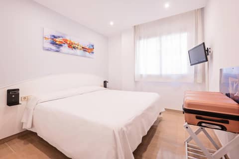 Aparthotel Napols - Abapart — bedroom