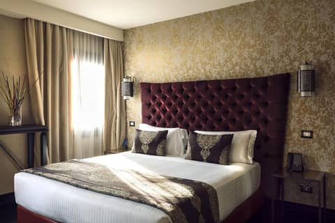 The Venice Times Hotel Vignette Collection by IHG — hotel room