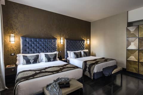 The Venice Times Hotel Vignette Collection by IHG — hotel room