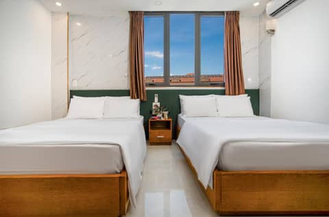 Trang Ngan Hotel by THG — hotel room