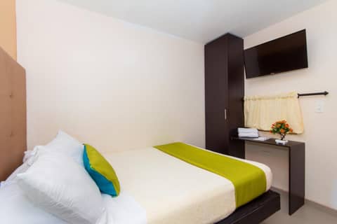 Azuán Suites Hotel By GEH Suites — hotel room
