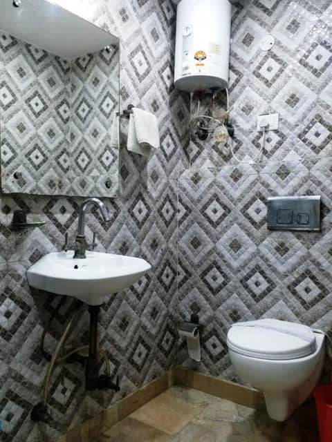 Hotel Laxman Resort by The Golden Taj Group &Hotels — bathroom