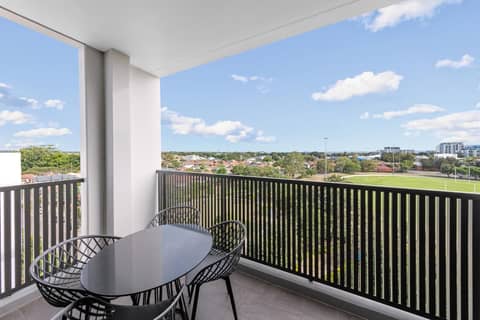 Meriton Suites Sydney Airport — balance & terrace