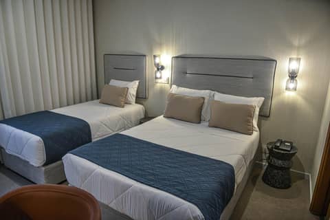 Hotel America — hotel room